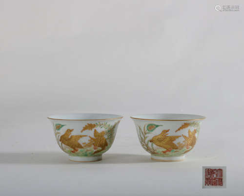 CHINESE PAIR OF FAMILLE ROSE FLOWER AND BIRD CUPS