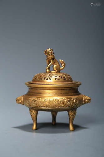 CHINESE GILT BRONZE TRIPOD CENSER WITH LION FINIAL