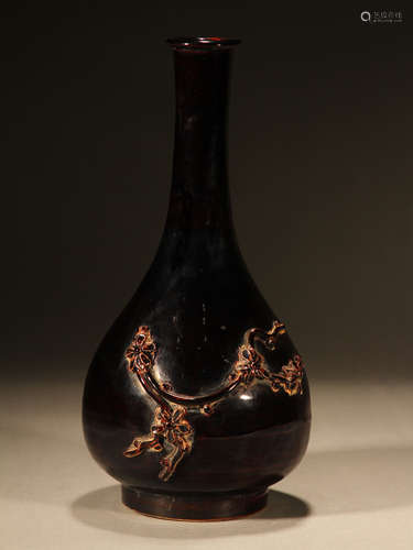 Ancient Jizhou kiln carved flask with plum blossom