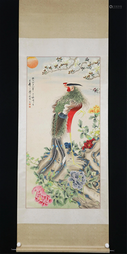 A CHINESE SCROLL PAINTING OF PHOENIX AND FLOWERS