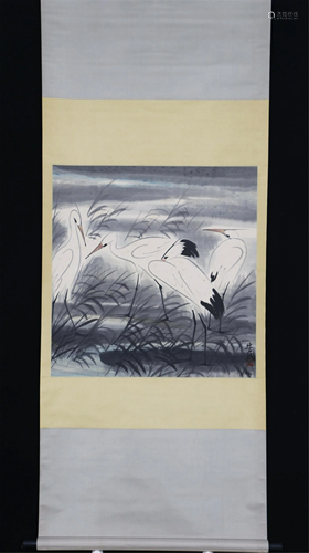 A CHINESE SCROLL PAINTING OF CRANES