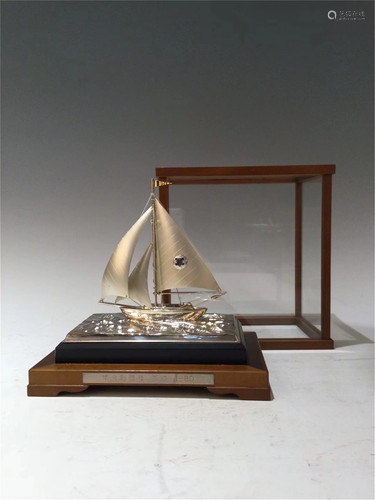 A SILVER DECORATIVE SAILING BOAT