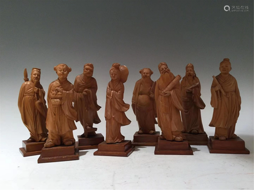 A GROUP OF HARDWOOD EIGHT IMMORTAL CARVINGS