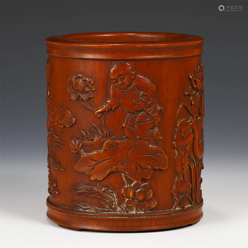 A CHINESE HARDWOOD CARVED FIGURAL BRUSH POT