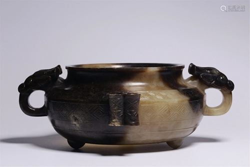 A JADE CARVED TRIPOD CENSER WITH BEAST HANDLES