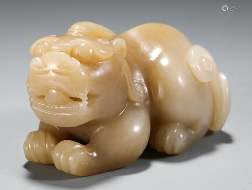 A CHINESE MYTHICAL BEAST JADE CARVING