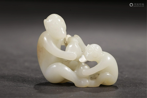 A WHITE JADE MONKEY-AND-PEACH CARVING