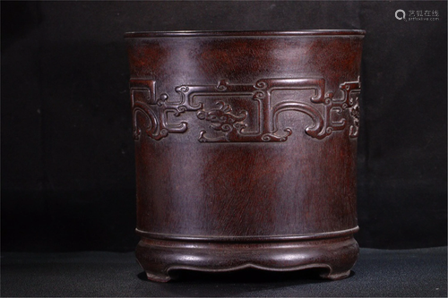 A CARVED CHI-DRAGON AND TAOTIE HARDWOOD BRUSH POT