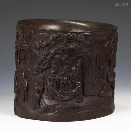 A CHINESE HARDWOOD CARVED FIGURAL BRUSH POT