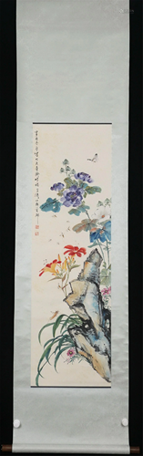 A CHINESE SCROLL PAINTING OF FLOWERS AND INSECTS