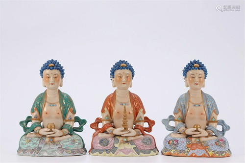 THREE FAMILLE ROSE PORCELAIN BUDDHA FIGURINES