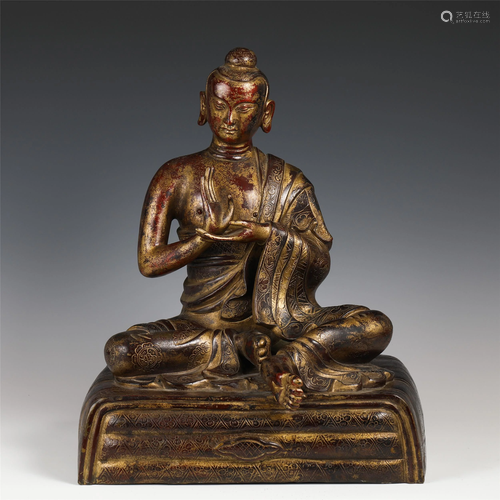 A CHINESE GILT BRONZE SAKYAMUNI