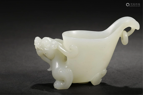 A WHITE JADE CARVED CHI-DRAGON JUE CUP