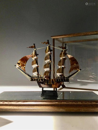 A TORTOISESHELL DECORATIVE SAILING BOAT