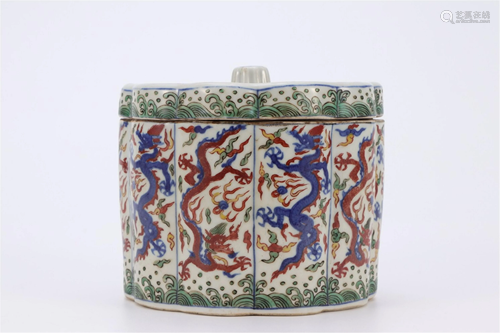 A WU-CAI DRAGONS PORCELAIN LOBED JAR AND COVER