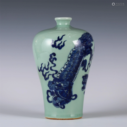 A CHINESE PEA GREEN GROUND BLUE AND WHITE VASE