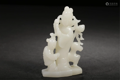 A WHITE JADE CARVING OF LADY AND KID