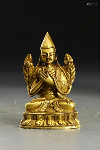 A BRONZE GILT SEATED TSONGKHAPA