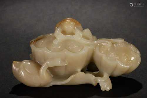 A CARVED JADE HAND PIECE