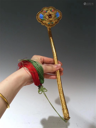 A SILVER GILT FLORAL RUYI