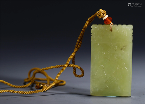 A CHINESE CARVED YELLOW JADE FIGURAL PENDANT