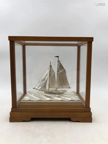 A SILVER DECORATIVE SAILING BOAT