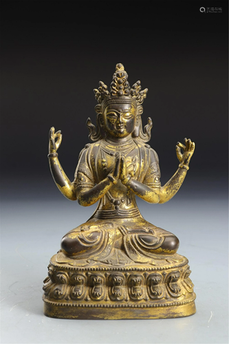 A GILT BRONZE FOUR-ARMED AVALOKITESVARA