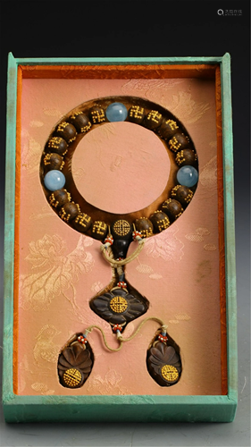 A STRING OF GOLD INLAID CHENXIANG WOOD PRAYER BEADS