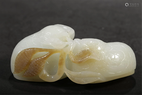 A WHITE JADE CARVING