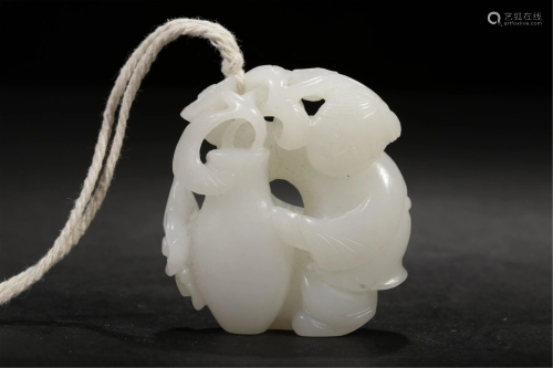 A WHITE JADE CARVING OF LADY HOLDING A VASE