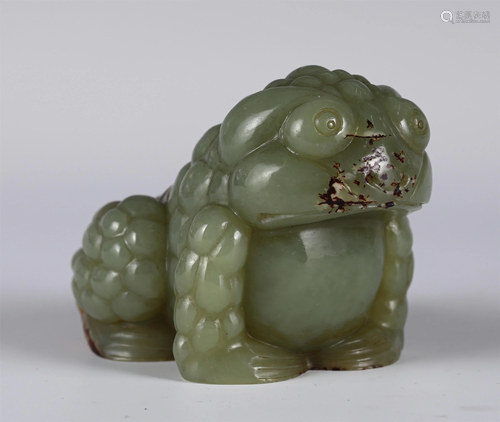 A CHINESE JADE MYTHICAL BEAST CARVING