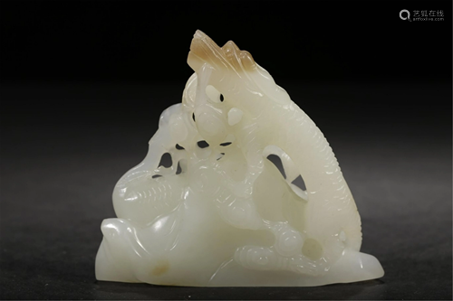 A JADE DECORATION CARVED WITH DRAGON AND PHOENIX