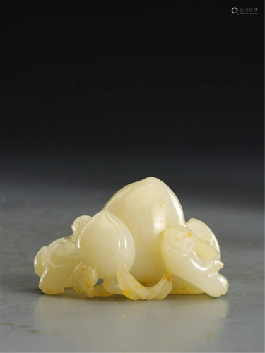 A WHITE JADE CARVED MONKEY-AND-PEACHES DECORATION