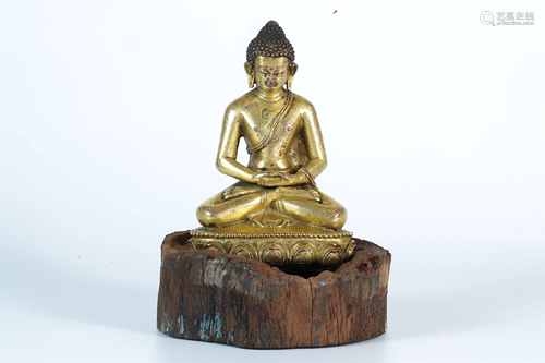 A Gilt-Bronze Figure of Gautama Buddha