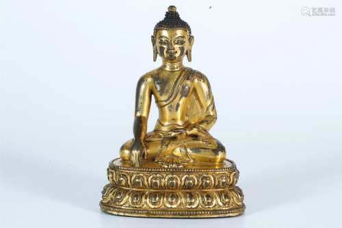 A Gilt-Bronze Figure of Gautama Buddha