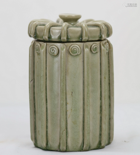 A Chinese Celadon Porcelain Vase With Lid