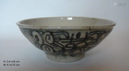 A VERY OLD PORCELAIN BOWL WITH A NATURAL CRACK