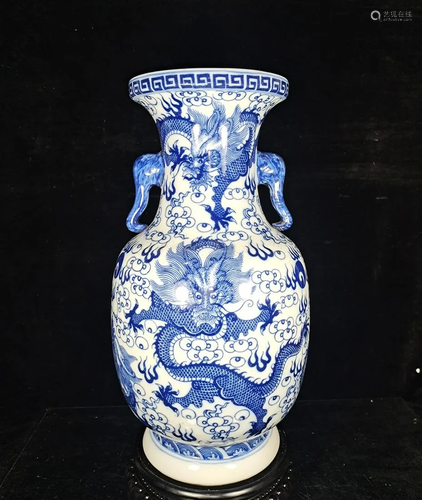 Qing Kangxi famille rose double-eared vase with