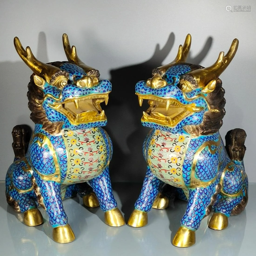 A pair of large lion of pure copper cloisonne gilt