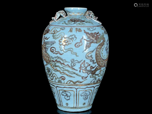 A plum vase with golden dragon and phoenix patterns