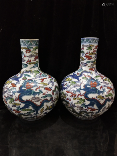 A pair of celestial vases with bean color and Kowloon