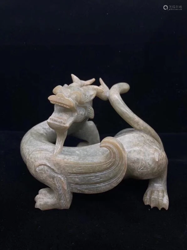 The Hetian jade dragon of the Han Dynasty, with