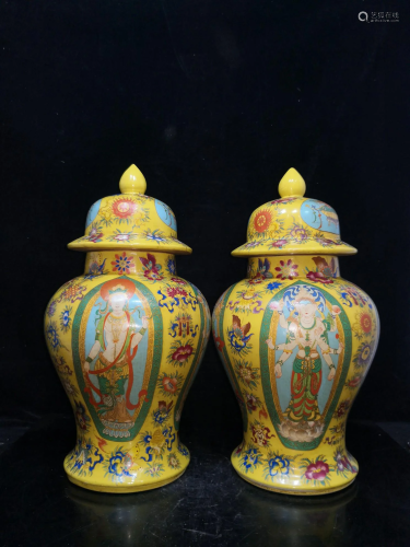 A pair of famille rose pots with window figures and