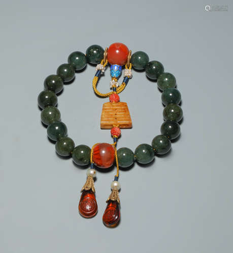 Green Jade Holding Ornament from Qing