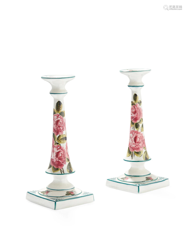 A PAIR OF WEMYSS WARE TALL CANDLESTICKS 'CABBAGE ROS…