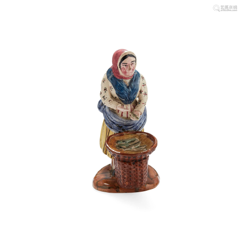 A SCOTTISH EAST COAST POTTERY NEWHAVEN FISHWIFE FIG…