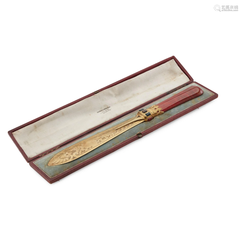 A VICTORIAN CASED GILT PAPER KNIFE RETAILED BY COCKBURN