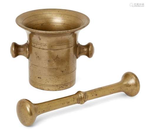 A bronze pestle and mortar, 18th century, with twin handles ...