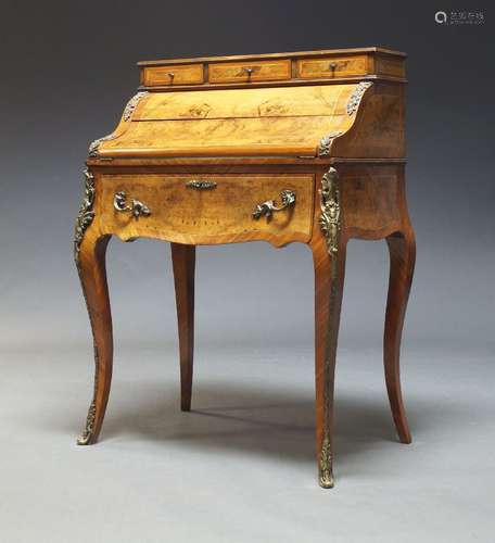 A Louis XV taste figured walnut and gilt metal mounted burea...