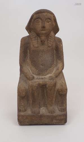 An Egyptian figure, early 20th century, in carved stone, the...